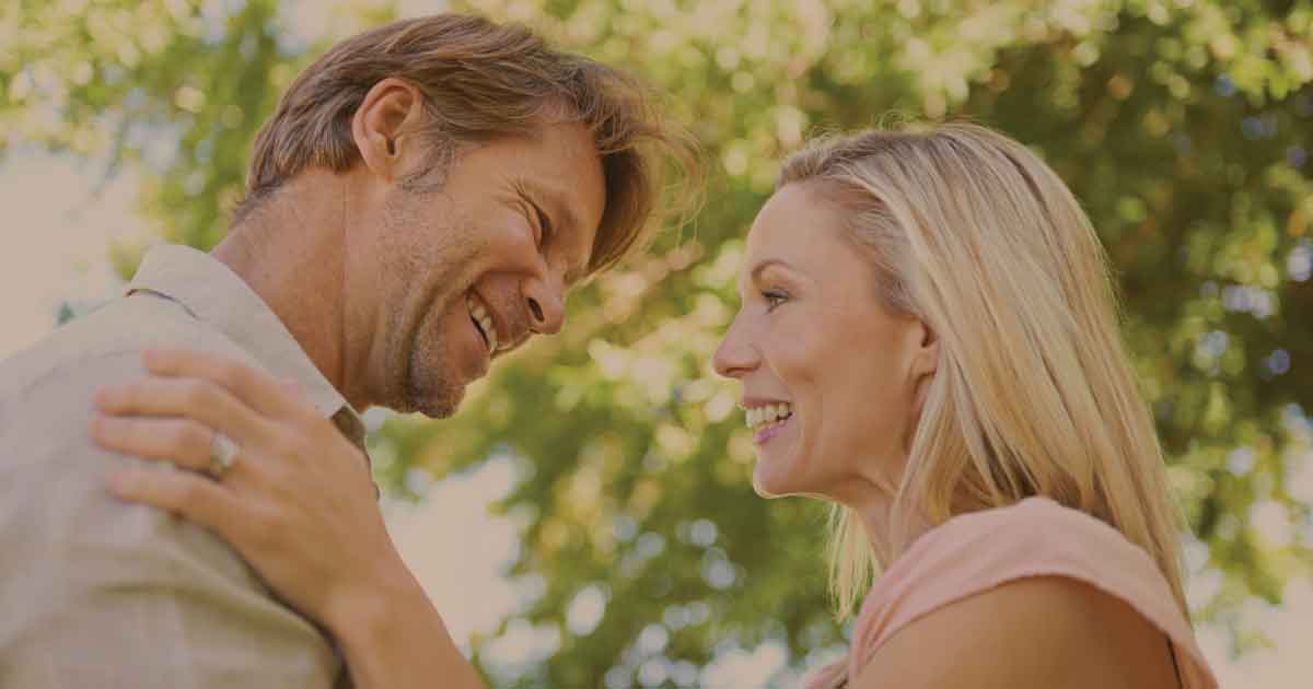 A happy married couple reconnecting after working through a difficult separation.