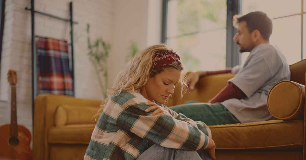 A wife emotionally withdrawing from her husband as she prepares for separation.