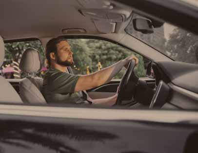 Husband sitting alone in his truck before a difficult conversation about marriage separation